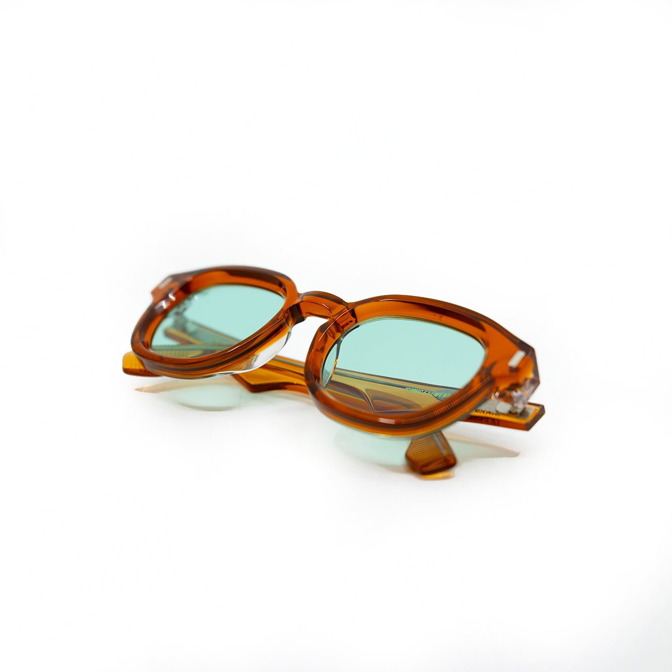 Tom Sunglasses with Amber Frame & Aqua Lens – TAXXON Eyewear